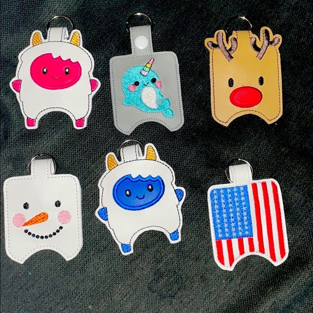 FREE W/$25 purchase NEW Earbuds/sanitizer keychain